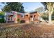 Brick ranch house with covered porch and ample yard space at 24947 Nc 24/27 Hwy, Albemarle, NC 28001