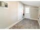 Laundry area with exterior access and tile flooring at 961 Shallowbrook Dr, Chester, SC 29706
