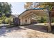 Brick home with attached carport and side yard at 961 Shallowbrook Dr, Chester, SC 29706