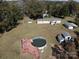Aerial view showing home, pool, and detached structures at 961 Shallowbrook Dr, Chester, SC 29706