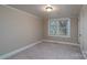 Simple bedroom with neutral walls and carpet flooring at 24947 Nc 24/27 Hwy, Albemarle, NC 28001