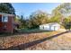 Brick house with detached two-car garage and spacious backyard at 24947 Nc 24/27 Hwy, Albemarle, NC 28001