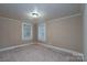 Simple bedroom with neutral walls and carpet flooring at 24947 Nc 24/27 Hwy, Albemarle, NC 28001