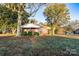 Brick ranch house with a yard and mature trees at 24947 Nc 24/27 Hwy, Albemarle, NC 28001