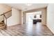 Open concept living room with view of kitchen and stairs at 14909 Tamarack Dr, Charlotte, NC 28278