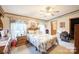Main bedroom with a queen-size bed and wood dresser at 1668 Lane Rd, Mount Holly, NC 28120
