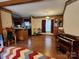 Open dining area with wood floors and built-in hutch at 1668 Lane Rd, Mount Holly, NC 28120