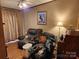 Relaxing living room with comfy seating and large window at 1668 Lane Rd, Mount Holly, NC 28120