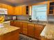 Spacious kitchen with granite countertops and wood cabinets at 206 Bayberry Dr, Salisbury, NC 28147