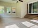 Sunroom addition with carpet flooring and brick steps to exterior at 206 Bayberry Dr, Salisbury, NC 28147