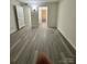 Bright bedroom with gray flooring and access to bathroom at 2123 Carriage Woods Ln, Kannapolis, NC 28081