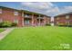 Brick building with lawn and balconies at 2123 Carriage Woods Ln, Kannapolis, NC 28081