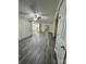 Spacious living room with grey vinyl flooring at 2123 Carriage Woods Ln, Kannapolis, NC 28081