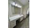 Elegant bathroom featuring a double vanity and a large mirror at 2123 Carriage Woods Ln, Kannapolis, NC 28081