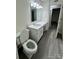 Clean bathroom with toilet and white vanity with quartz countertop at 2123 Carriage Woods Ln, Kannapolis, NC 28081