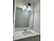 Bathroom features a vanity with a large mirror and a shower at 2123 Carriage Woods Ln, Kannapolis, NC 28081