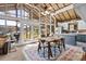 Bright and airy living room with floor to ceiling windows and lake views at 364 Catalina Dr, Mooresville, NC 28117