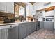 Modern kitchen with gray cabinets and marble countertops at 364 Catalina Dr, Mooresville, NC 28117