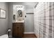 Modern bathroom with wood vanity, new fixtures and shower at 364 Catalina Dr, Mooresville, NC 28117