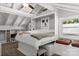 Small bedroom with built-in murphy bed and window seat at 364 Catalina Dr, Mooresville, NC 28117