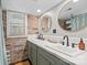 Bathroom with double vanity, marble countertop, and exposed brick at 364 Catalina Dr, Mooresville, NC 28117