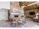 Bright dining area with mid-century modern table and chairs, near fireplace at 364 Catalina Dr, Mooresville, NC 28117