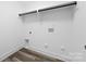 Clean and bright laundry room with ample space at 5311 Carden Dr, Charlotte, NC 28227