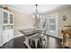 Formal dining room with hardwood floors and built-in hutch at 5670 Gold Creek Bay Dr, Hickory, NC 28601