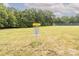 Community disc golf course with basket at 6722 Beverly Springs Dr, Charlotte, NC 28270