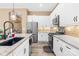 Modern kitchen with stainless steel appliances and granite countertops at 131 Chimney Rock Ct, Denver, NC 28037