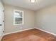 Bright bedroom with hardwood floors and neutral walls at 2255 Sides Rd, Rockwell, NC 28138