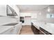 Bright kitchen with white cabinets, stainless steel appliances, and an island at 1024 Seven Sisters Ave, Monroe, NC 28110