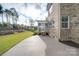 Brick house with screened porch and patio at 10881 Greenvale Dr, Harrisburg, NC 28075