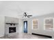 Living room featuring a stone fireplace and hardwood floors at 137 Brady Ln, Statesville, NC 28625