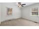 Bedroom with carpet flooring, ceiling fan and window coverings at 137 Brady Ln, Statesville, NC 28625