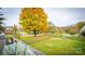 Deck overlooking backyard with fall foliage and trees at 326 Thistle Ln, Statesville, NC 28625