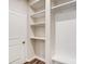 Bright foyer with built-in shelving and bench seating at 14905 Tamarack Dr, Charlotte, NC 28278