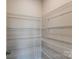 Large walk-in pantry with wire shelving at 14905 Tamarack Dr, Charlotte, NC 28278
