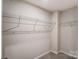 Walk-in closet with wire shelving, offering ample storage space at 14905 Tamarack Dr, Charlotte, NC 28278