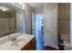 Clean bathroom with single sink vanity, bathtub, and toilet at 8614 Sawleaf Ct, Charlotte, NC 28215