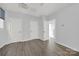 Bright bedroom with two closets and wood-look flooring at 339 East Blvd, Charlotte, NC 28203