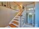 Elegant staircase with wooden treads and white railings at 94 Heritage Dr, Lake Wylie, SC 29710