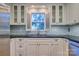 Modern kitchen with stainless steel appliances and light-colored cabinets at 94 Heritage Dr, Lake Wylie, SC 29710