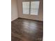 Spacious bedroom with hardwood floors and window blinds at 929 Roxburgh Ave # 51, Rock Hill, SC 29732