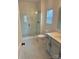Modern bathroom with a walk-in shower, gray tile, and a gray vanity at 929 Roxburgh Ave # 51, Rock Hill, SC 29732