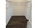 Spacious closet with wire shelving and dark wood-look flooring at 929 Roxburgh Ave # 51, Rock Hill, SC 29732
