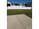 Spacious backyard with a large concrete patio, perfect for outdoor entertaining at 929 Roxburgh Ave # 51, Rock Hill, SC 29732
