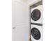 Convenient laundry closet with stacked LG washer and dryer at 339 Halton Crossing Sw Dr, Concord, NC 28027