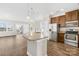 Modern kitchen with stainless steel appliances and granite countertops at 339 Halton Crossing Sw Dr, Concord, NC 28027