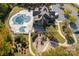 Aerial view of community pool, clubhouse, and playground at 3067 Trace Meadow Ct, York, SC 29745